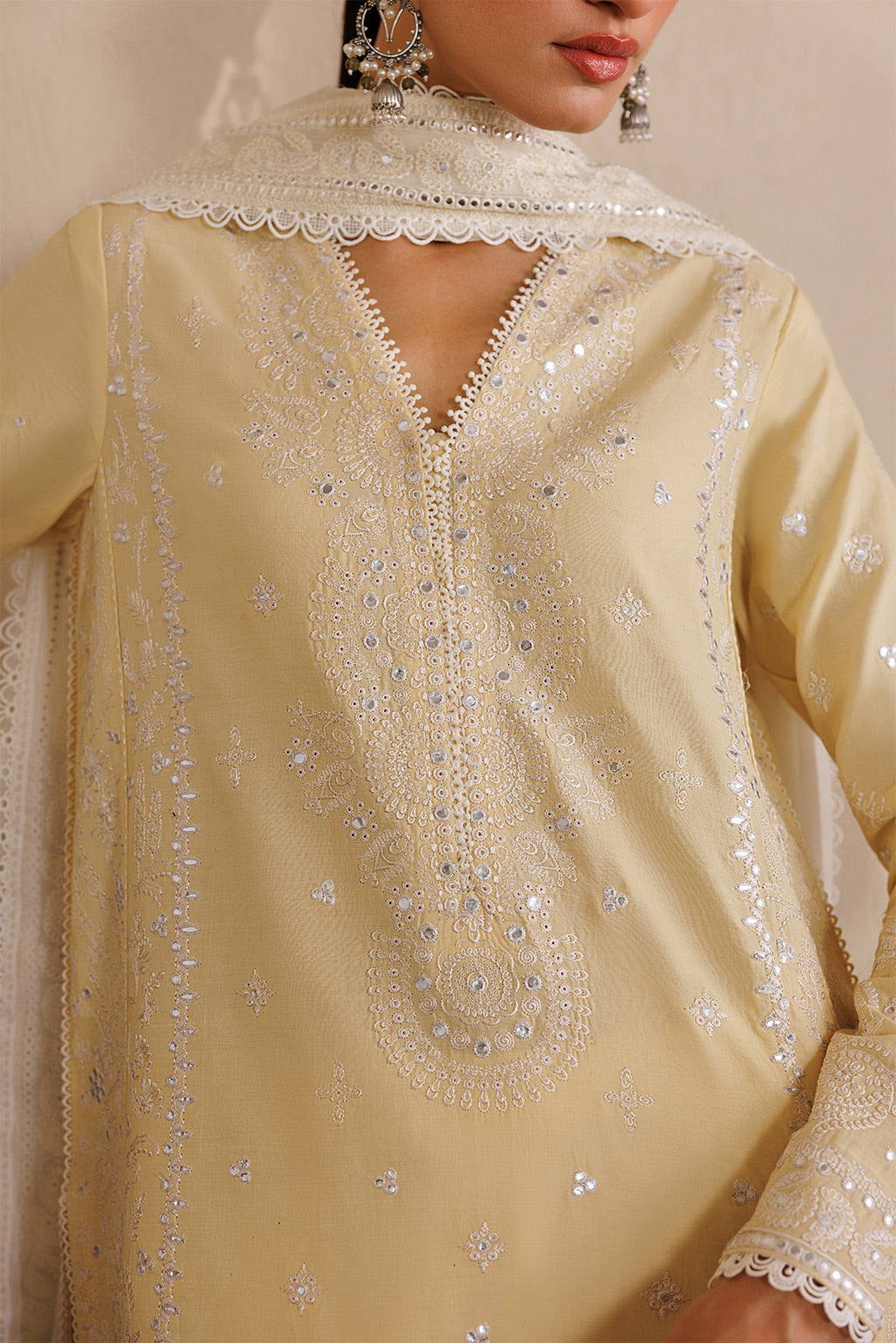 Emaan Adeel NOSTALIGA P0125 lawn outfit in pale yellow — embroidery close-up