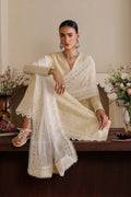 Emaan Adeel NOSTALIGA P0125 lawn outfit in pale yellow — seated view