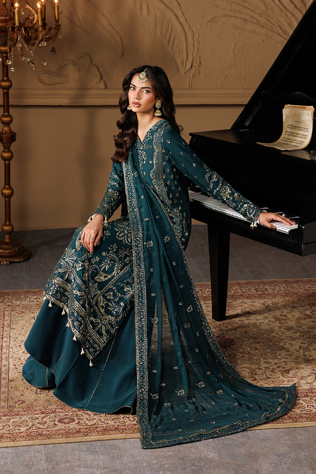 Emaan Adeel ASTERIA S0458 chiffon outfit in deep teal — seated view