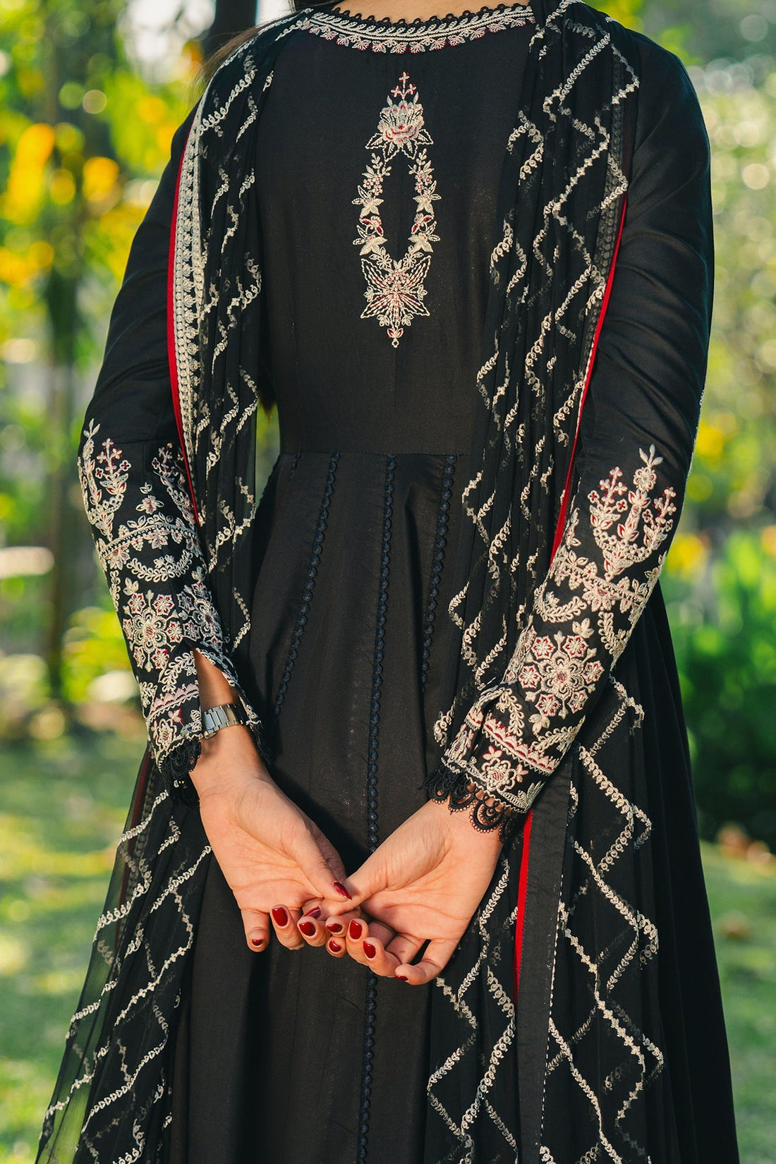 Model wearing Afrozeh Parizaad black shirt & trouser set