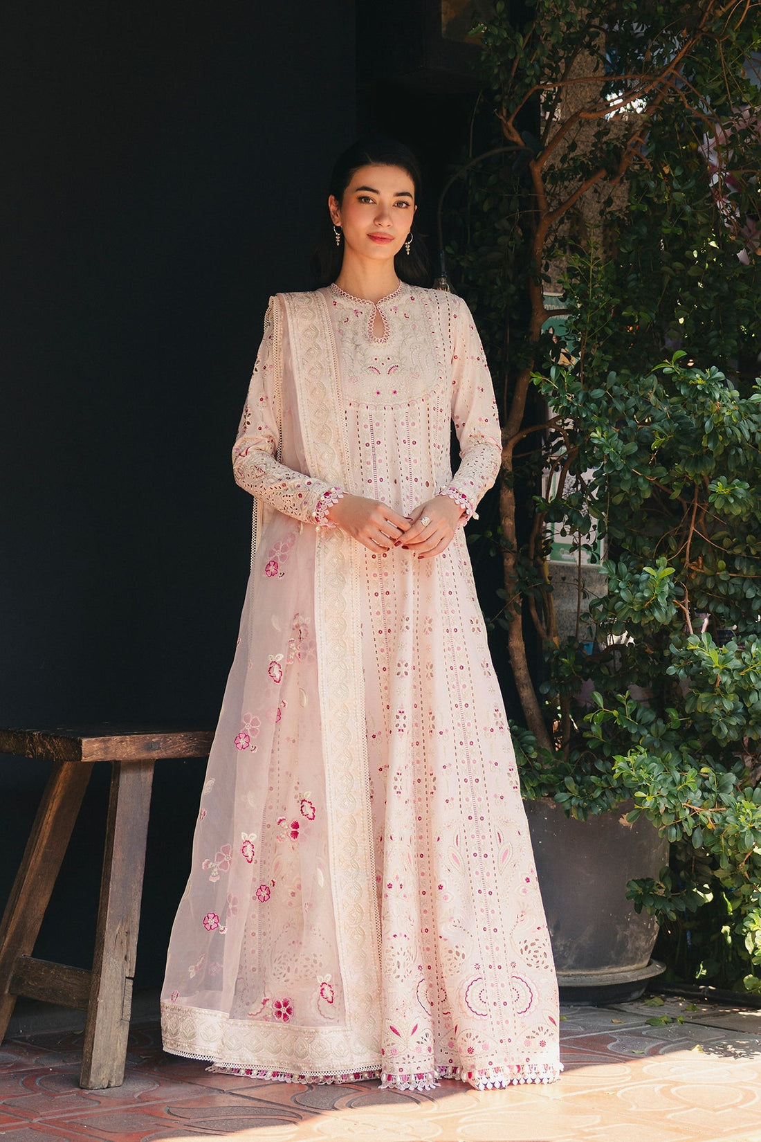 Model wearing Afrozeh Khamoshi peach shirt & trouser set