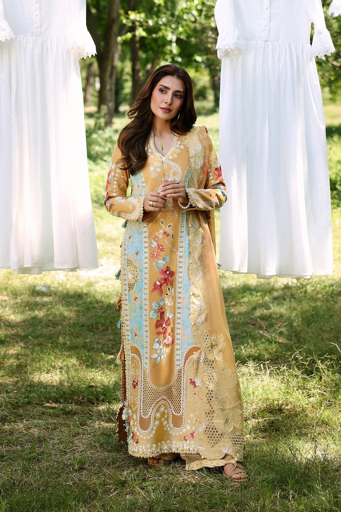 Model wearing Afrozeh Leial gold shirt & trouser set