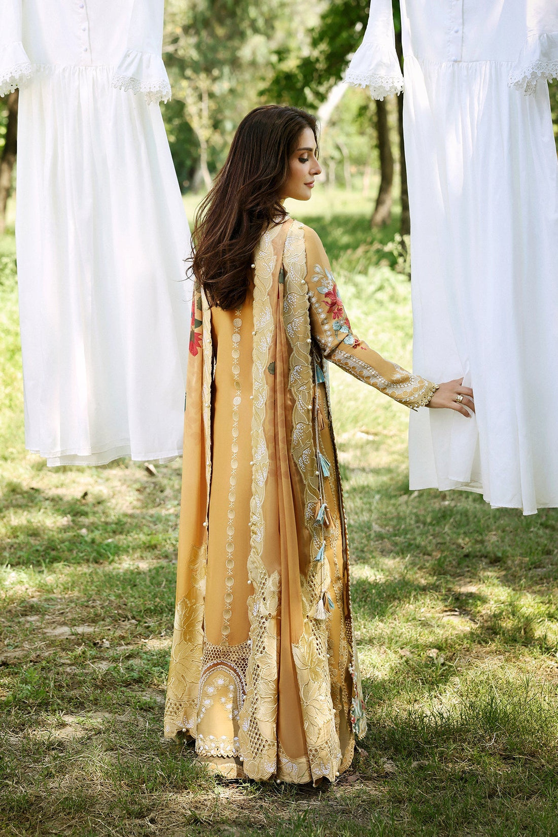 Model wearing Afrozeh Leial gold shirt & trouser set