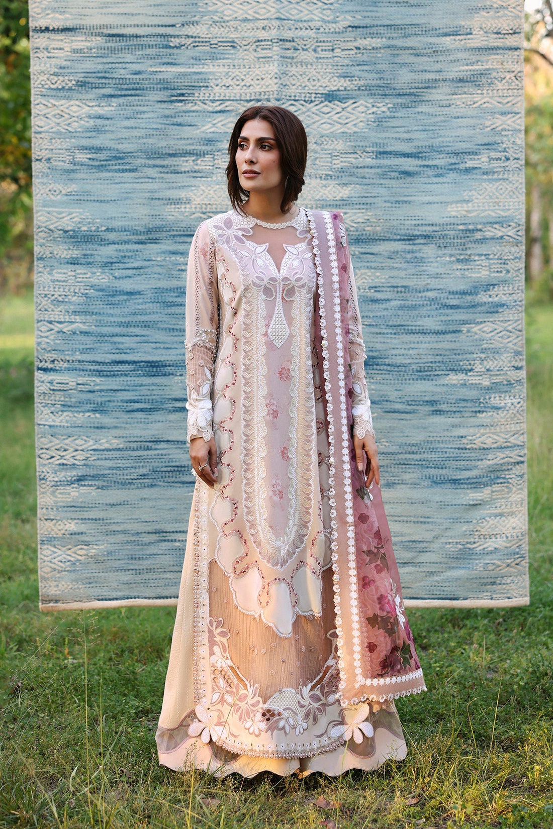 Model wearing Afrozeh Zeyam ivory shirt & trouser set