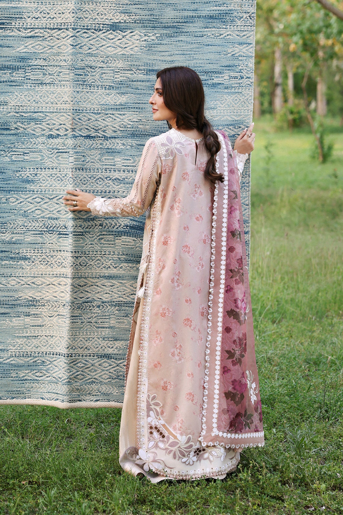 Model wearing Afrozeh Zeyam ivory shirt & trouser set