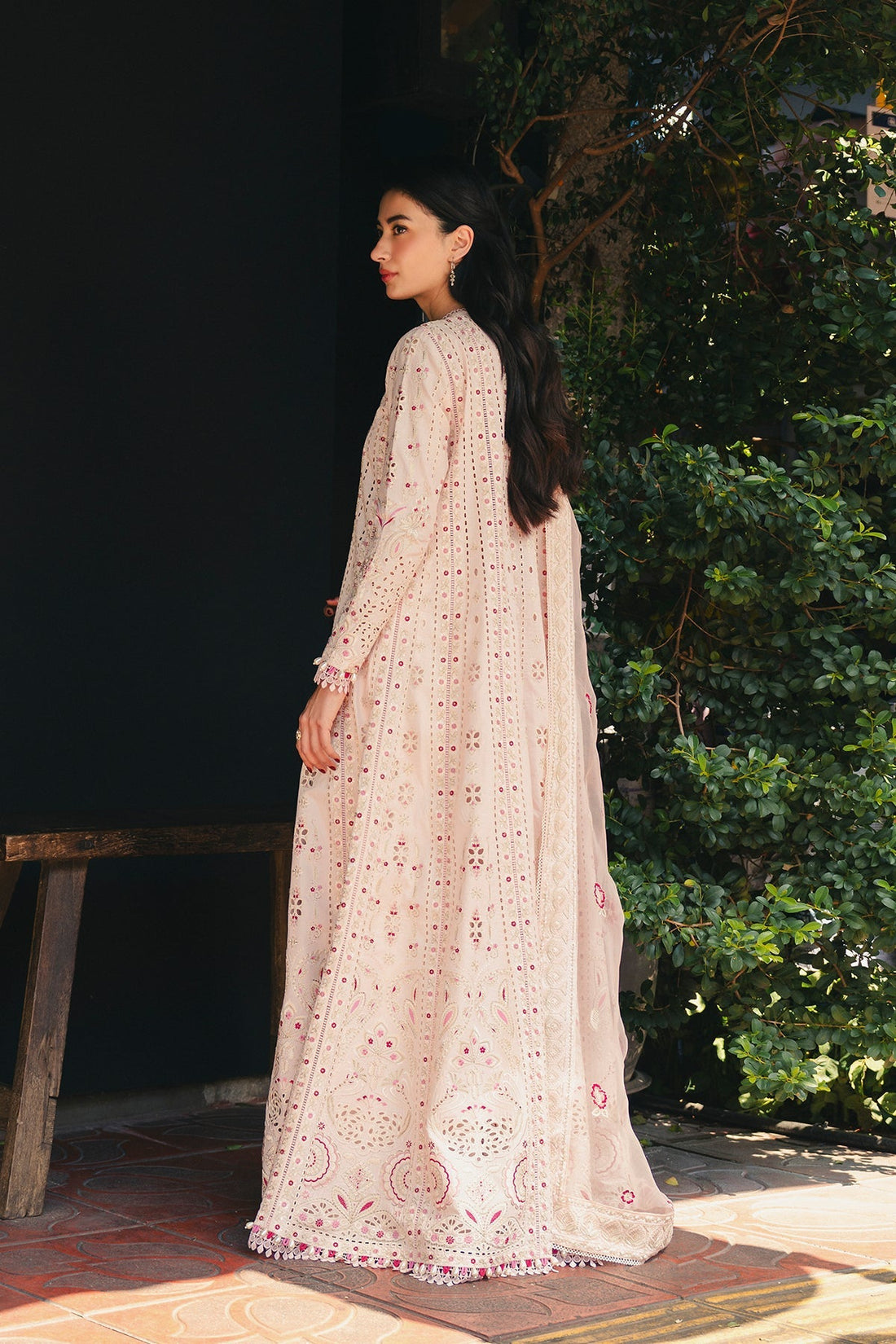 Model wearing Afrozeh Khamoshi peach shirt & trouser set