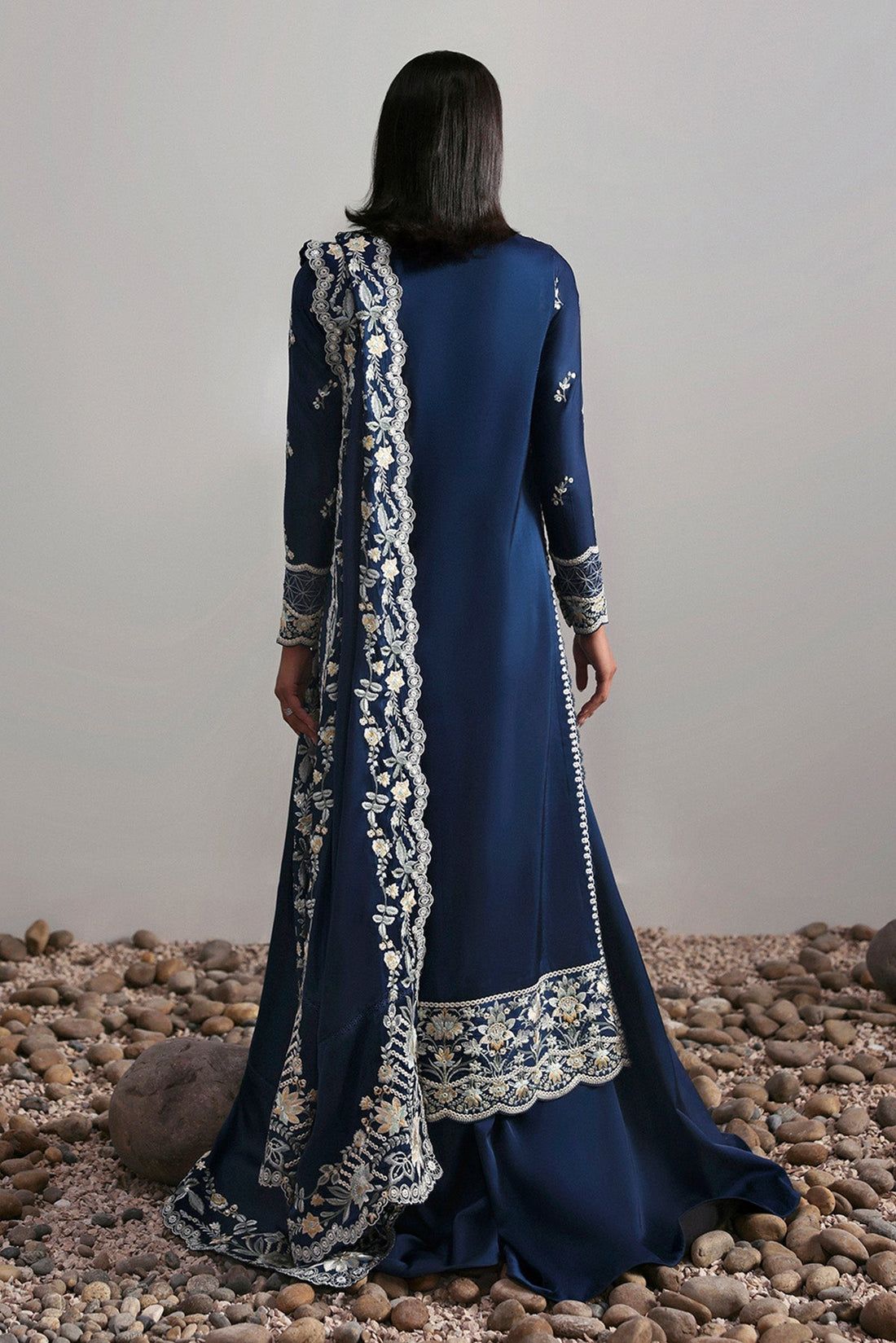 Model wearing Afrozeh Alara ivory long shirt & sharara