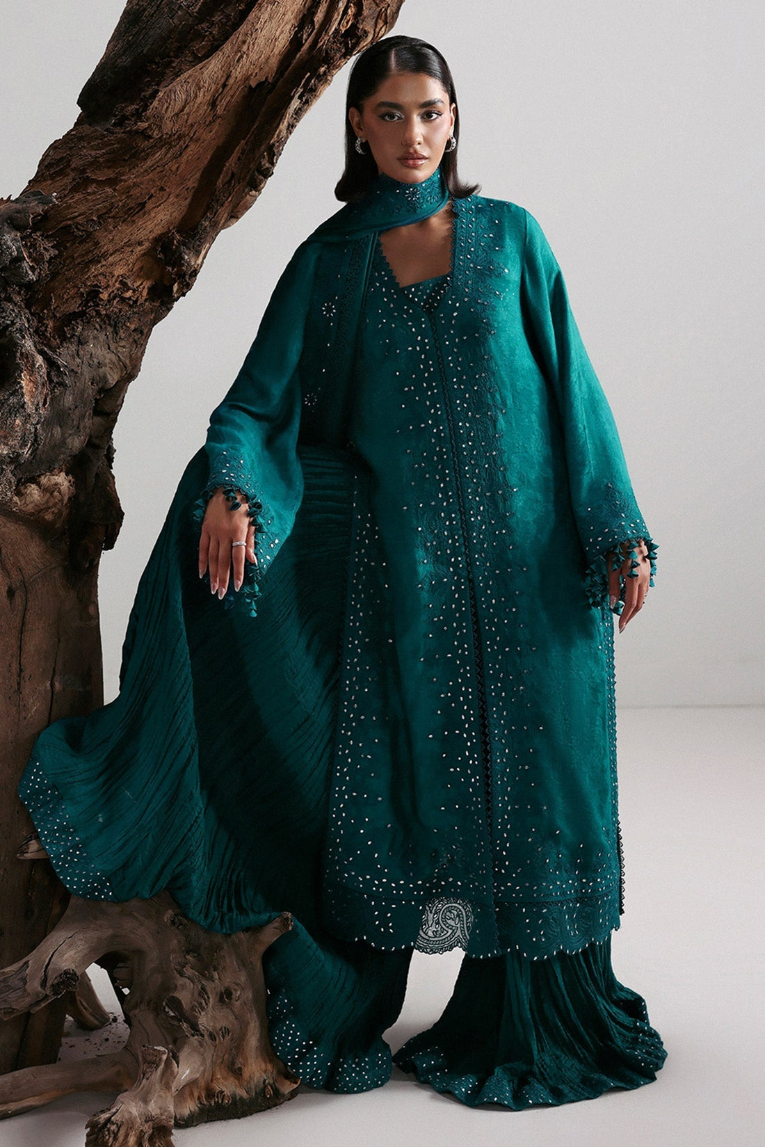 Model wearing Afrozeh Valentena teal long shirt & gharara