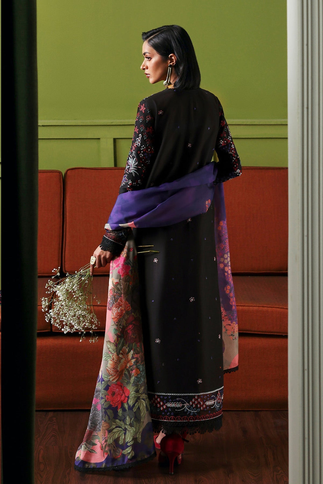 Model wearing Afrozeh Etherea black embroidered lawn suit