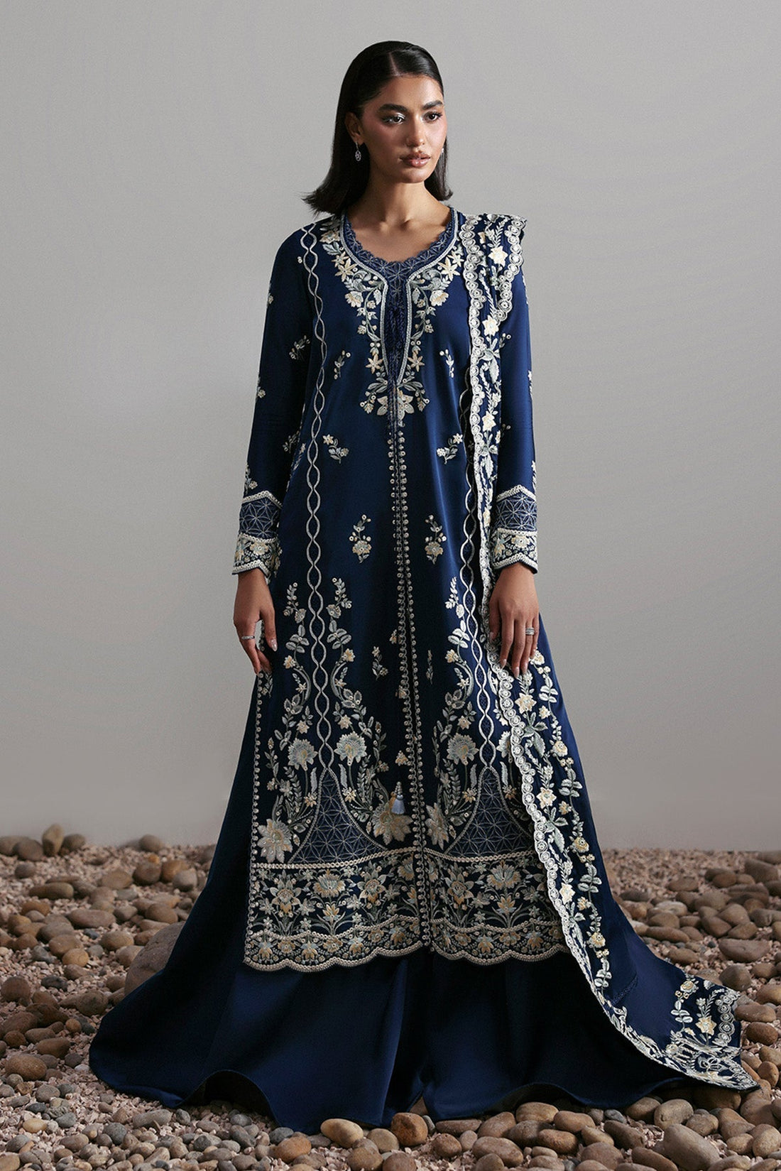 Model wearing Afrozeh Alara ivory long shirt & sharara