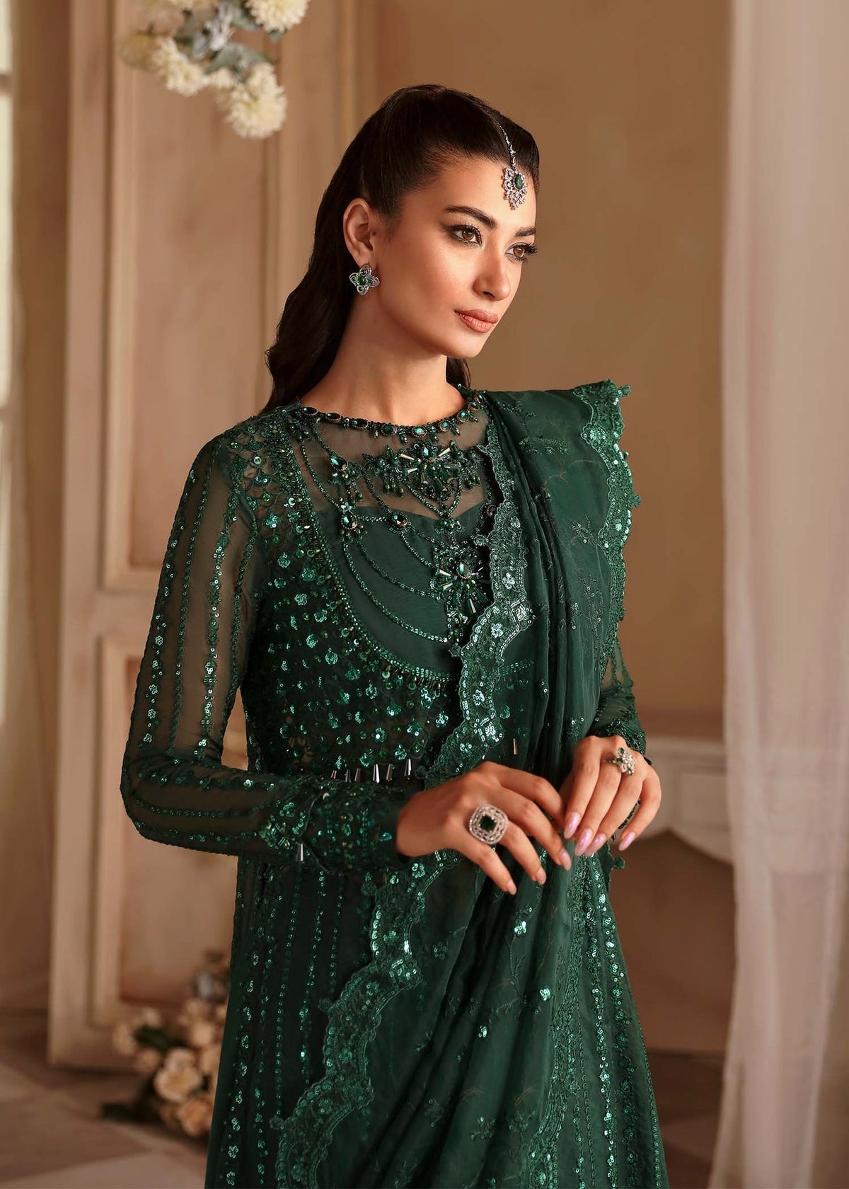 Akbar Aslam Emeraude back view