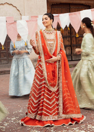 Model wearing Akbar Aslam CYPRESS red panelled maxi with dupatta
