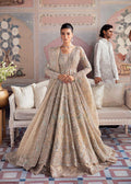 Model wearing Akbar Aslam MOONSTONE light peach panelled maxi with dupatta