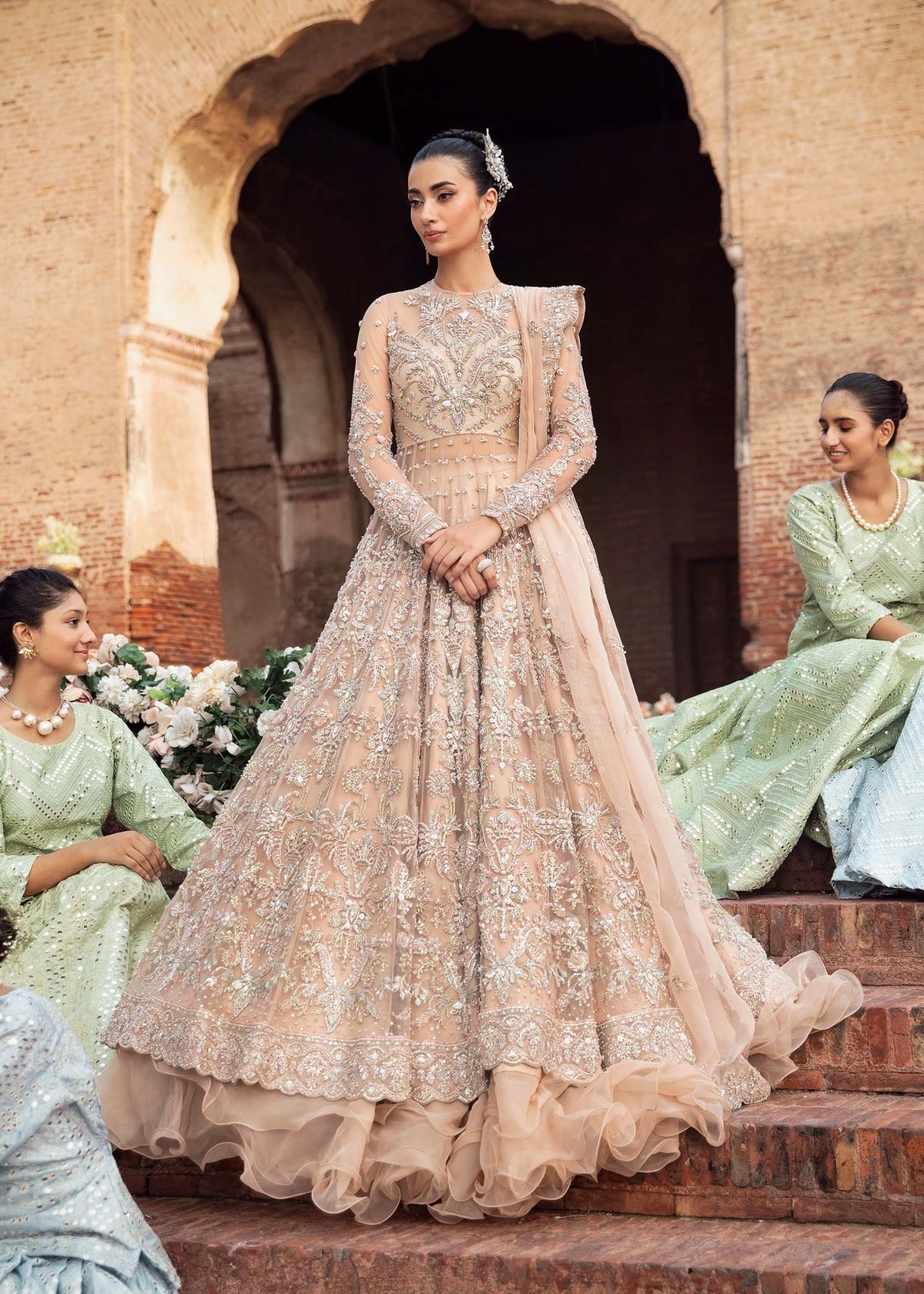 Model wearing Akbar Aslam TEMPEST peach panelled maxi with dupatta