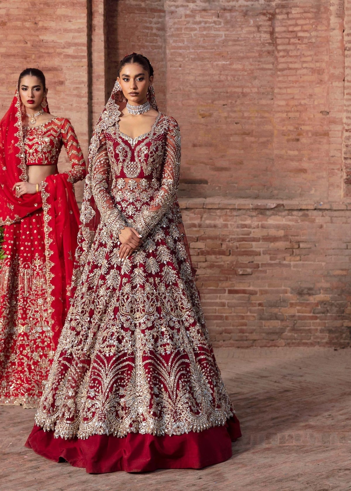 Model wearing Akbar Aslam TWILIGHT red shirt & trousers co-ord