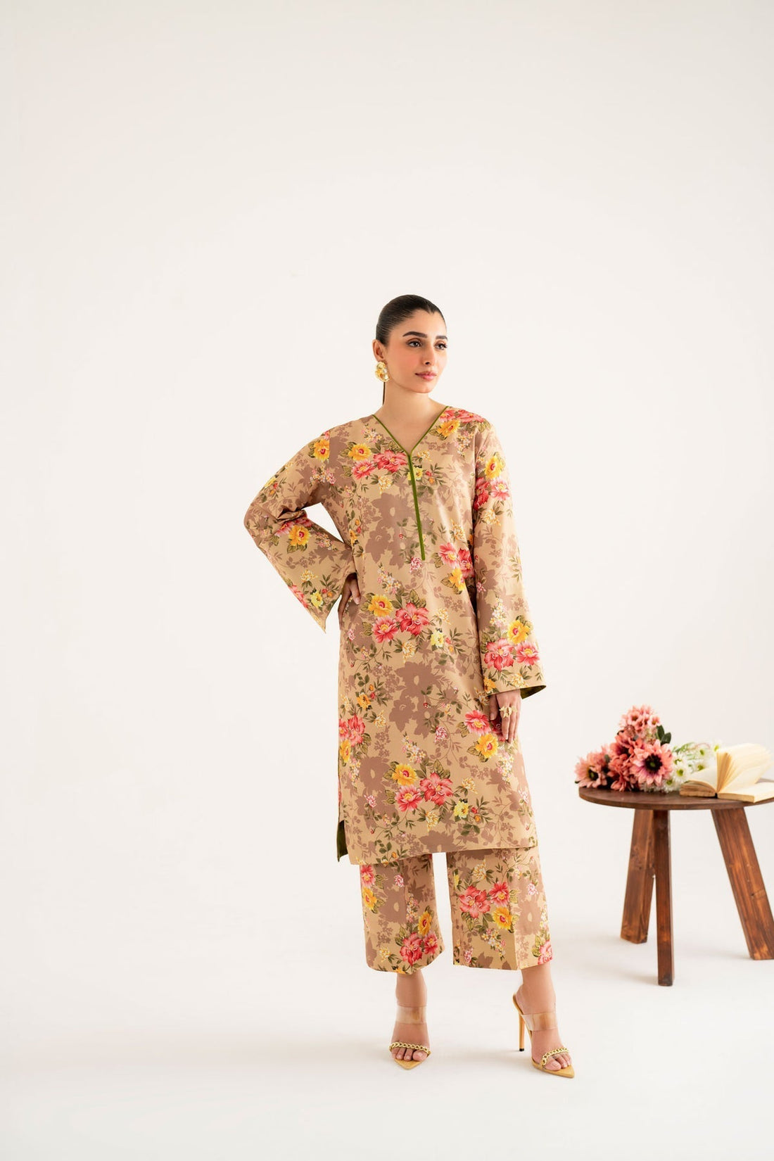 Model wearing Akbar Aslam Belva long shirt & trousers co-ord