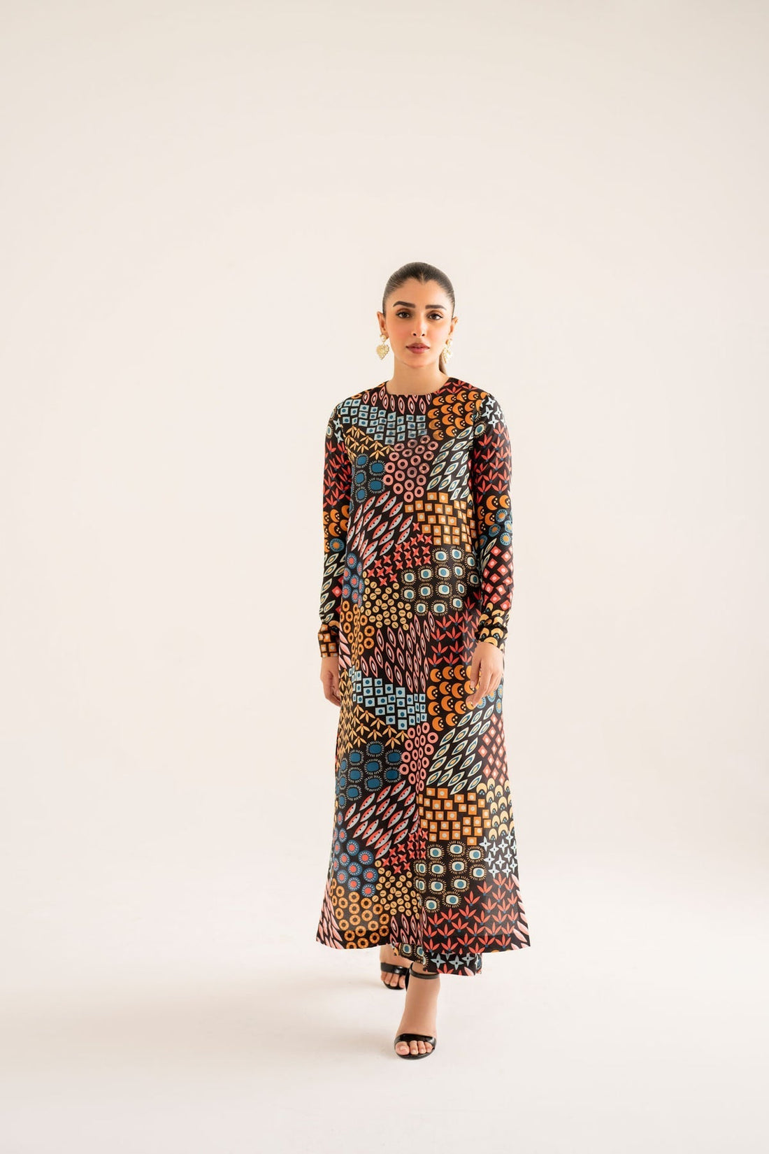 Model wearing Akbar Aslam Beth long shirt & trousers co-ord