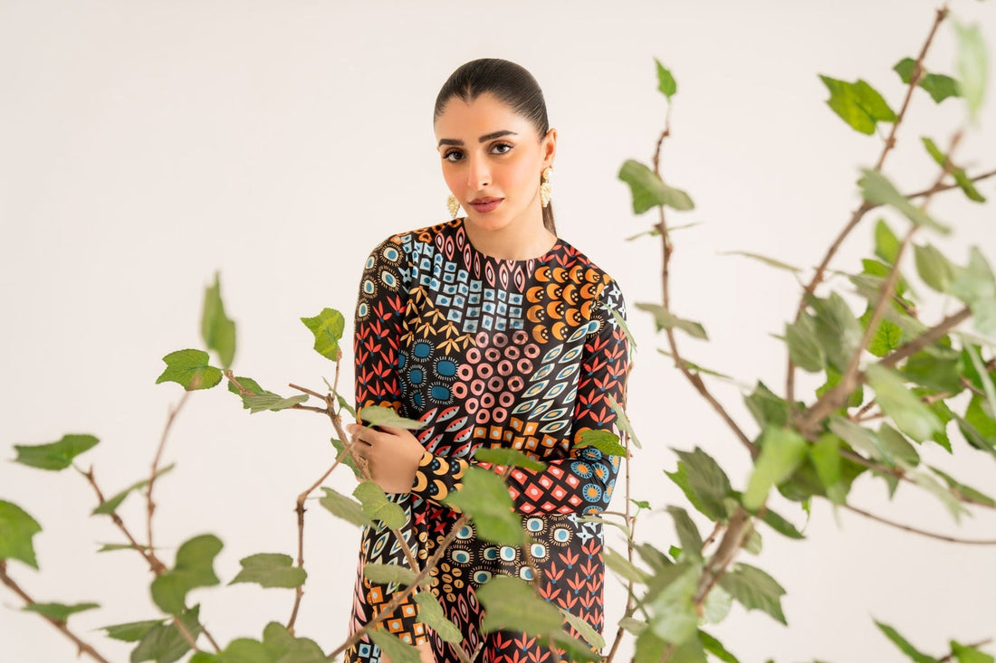 Model wearing Akbar Aslam Beth long shirt & trousers co-ord