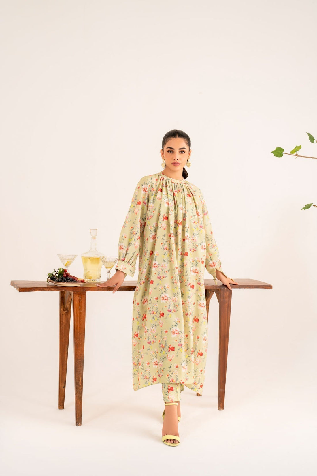 Model wearing Akbar Aslam Fia long shirt & trousers co-ord