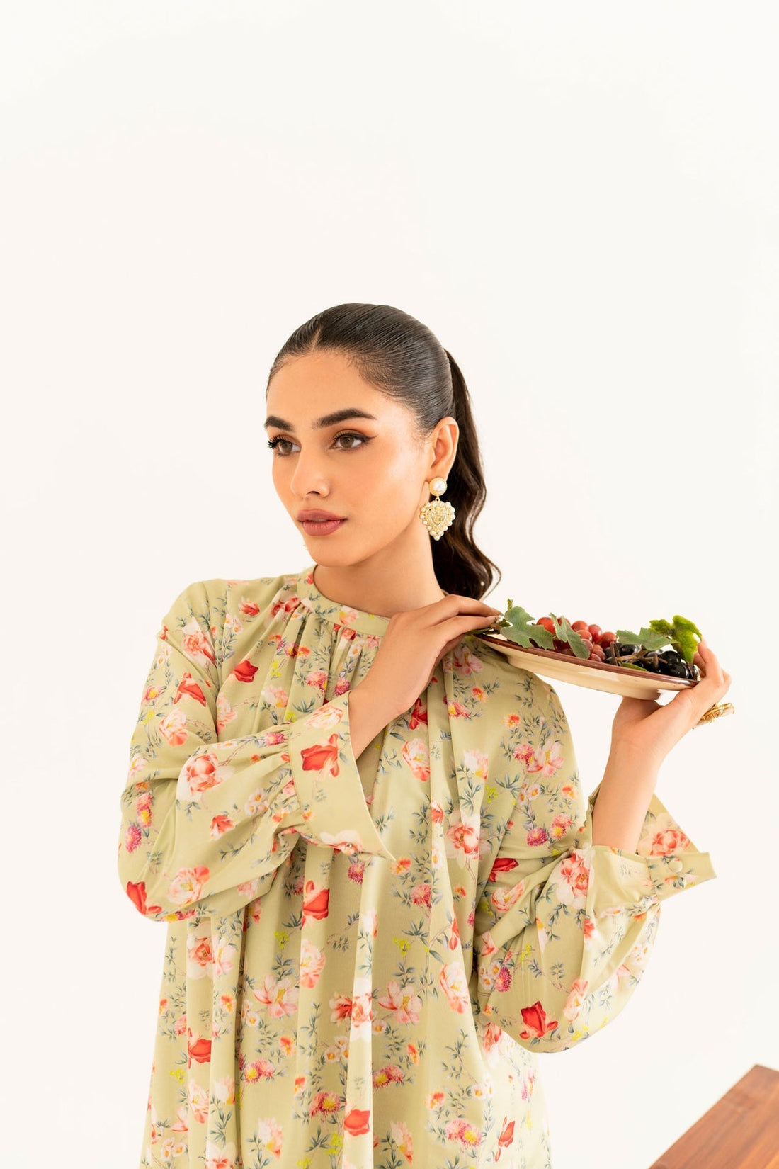 Model wearing Akbar Aslam Fia long shirt & trousers co-ord
