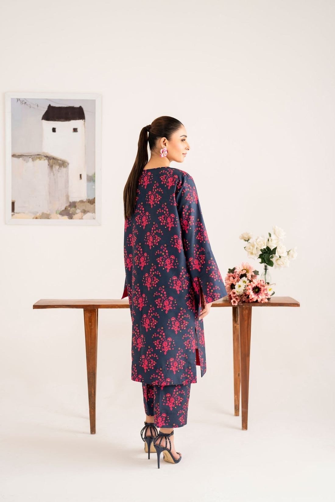 Model wearing Akbar Aslam Isla long shirt & trousers co-ord