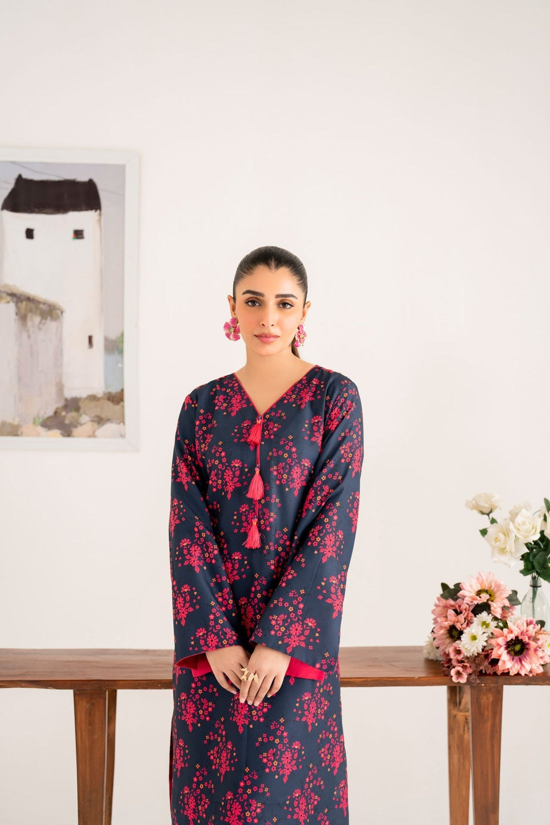 Model wearing Akbar Aslam Isla long shirt & trousers co-ord