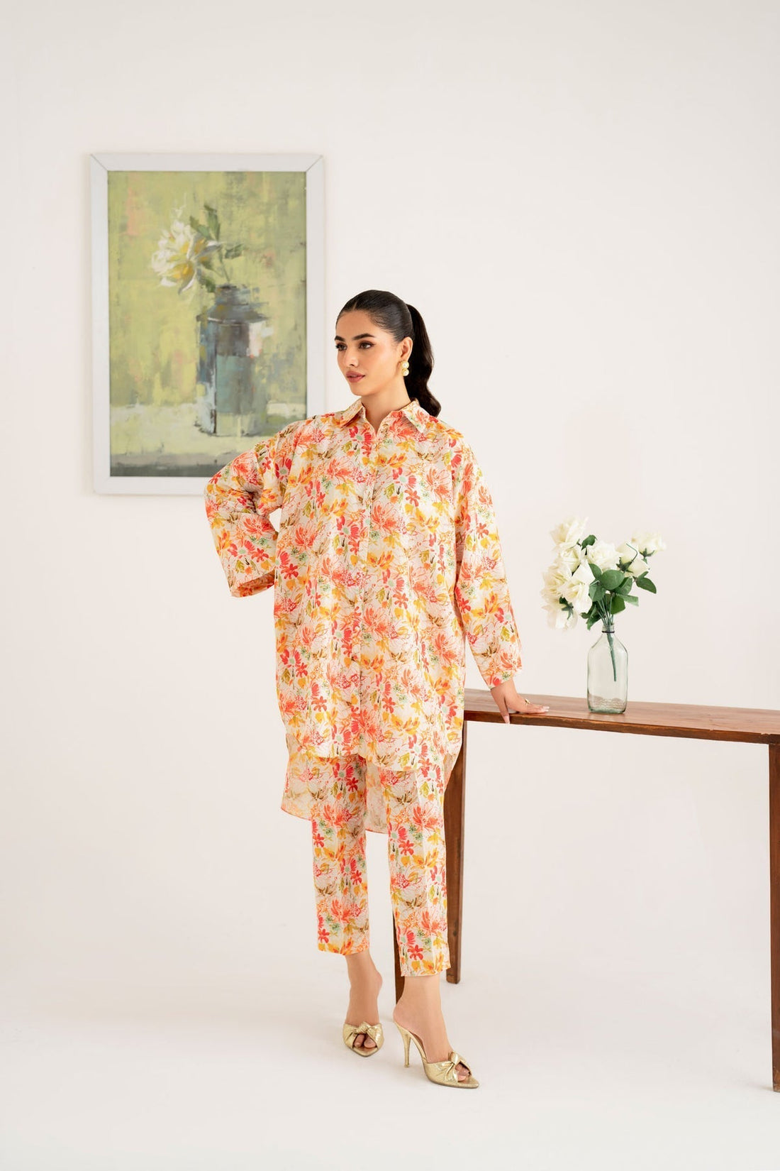 Model wearing Akbar Aslam Jolie long shirt & trousers co-ord