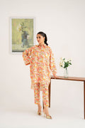 Model wearing Akbar Aslam Jolie long shirt & trousers co-ord