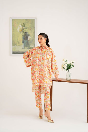 Model wearing Akbar Aslam Jolie long shirt & trousers co-ord