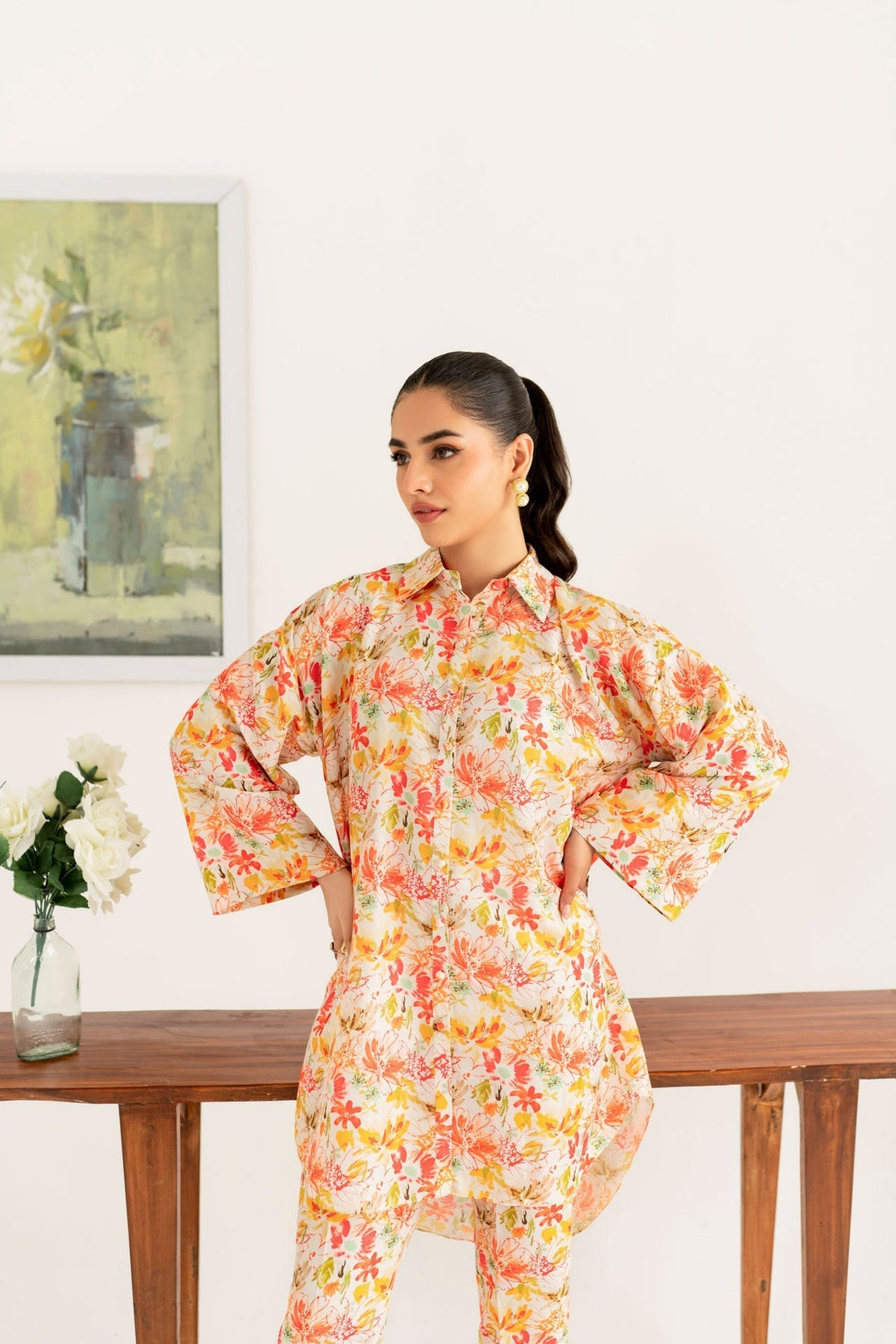 Model wearing Akbar Aslam Jolie long shirt & trousers co-ord