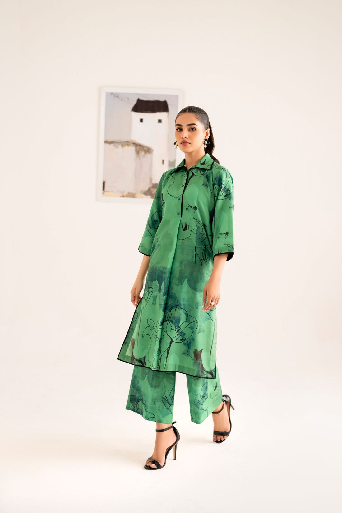 Model wearing Akbar Aslam Luna long shirt & trousers co-ord