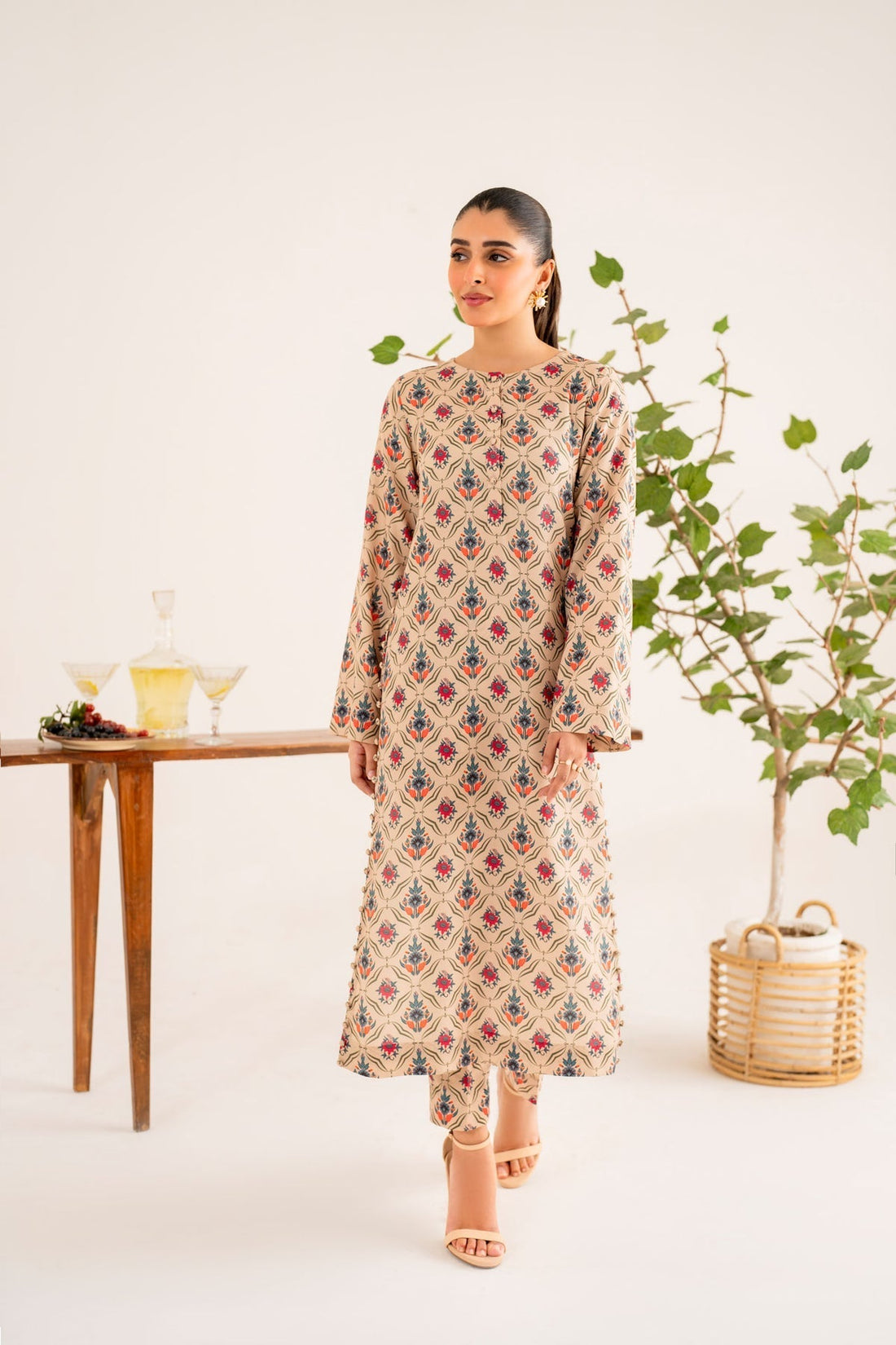 Model wearing Akbar Aslam Mary long shirt & trousers co-ord