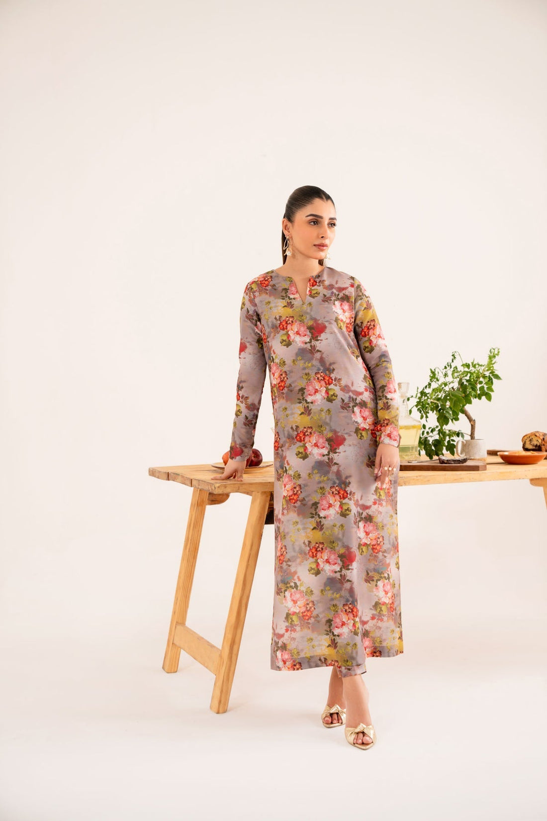 Model wearing Akbar Aslam Taria long shirt & trousers co-ord