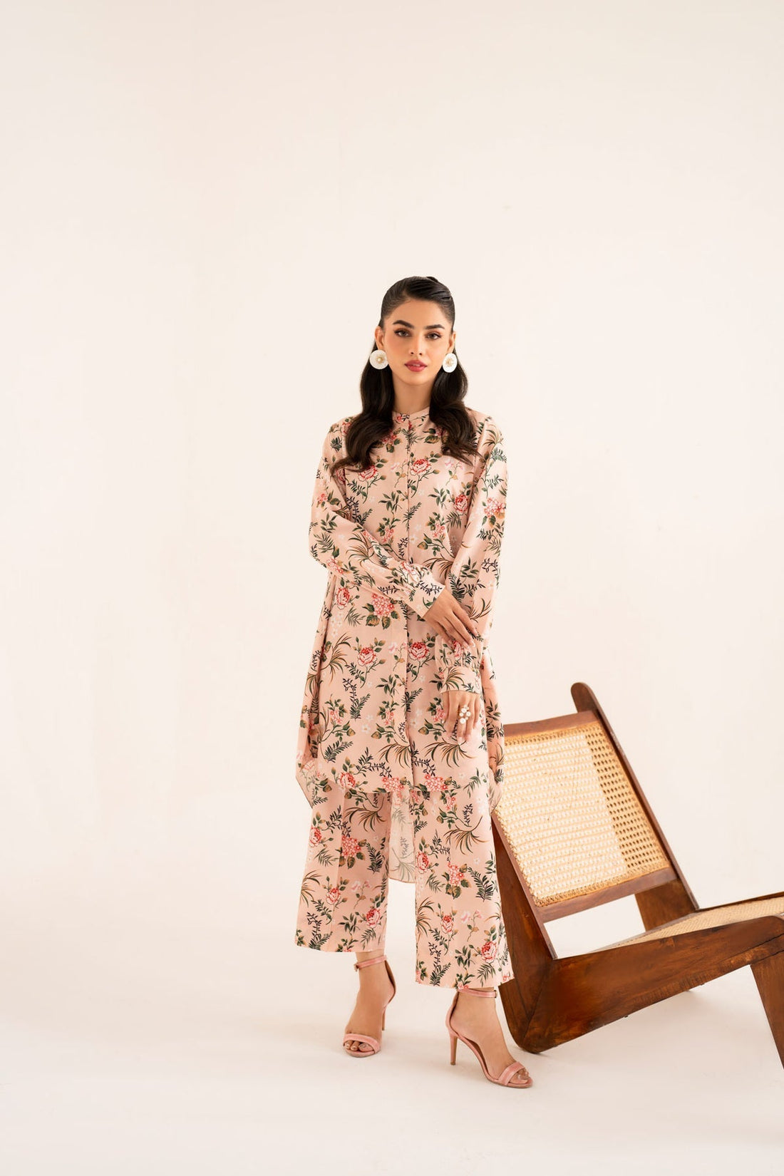 Model wearing Akbar Aslam Uznir long shirt & trousers co-ord