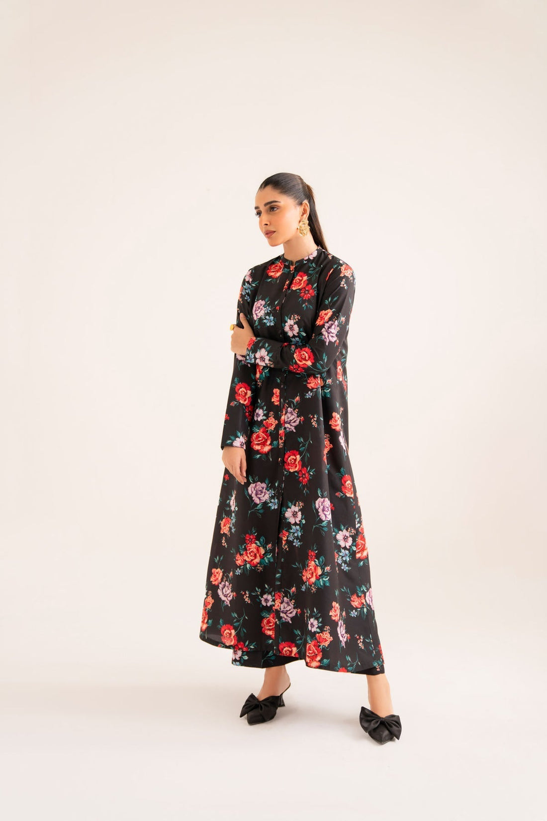 Model wearing Akbar Aslam Zulaim long shirt & trousers co-ord