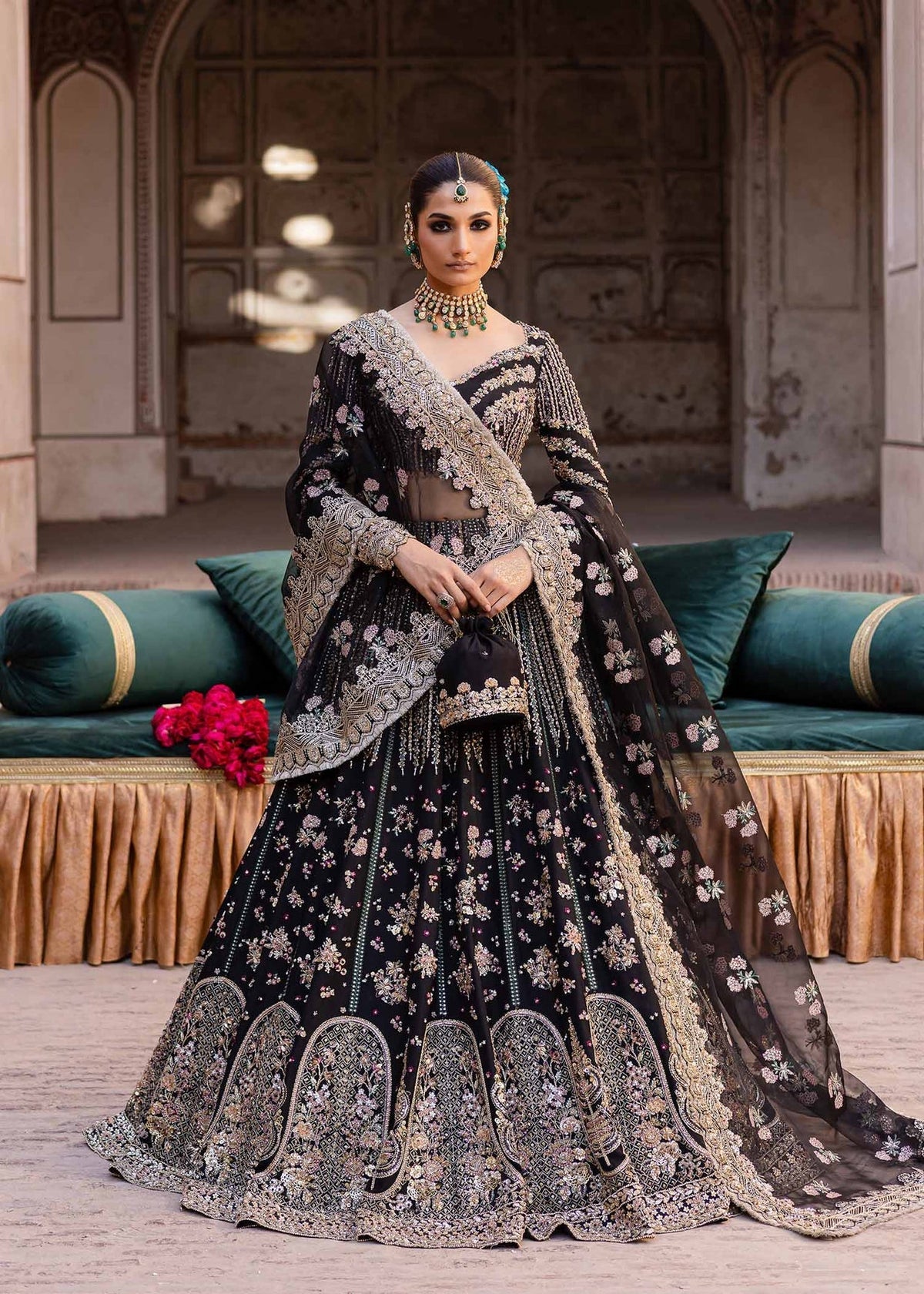 Model wearing Akbar Aslam Nehaab blouse & lehenga with dupatta
