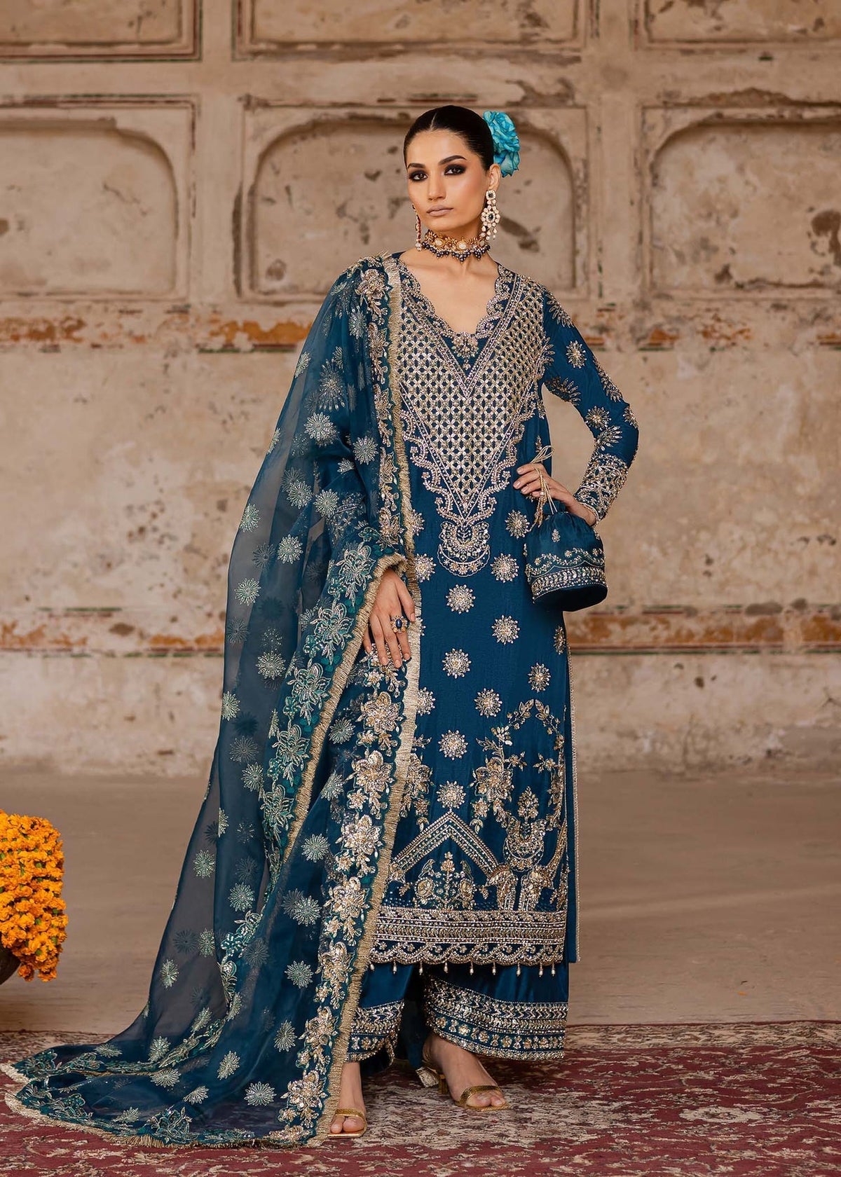 Model wearing Akbar Aslam Zinia shirt & trousers with dupatta