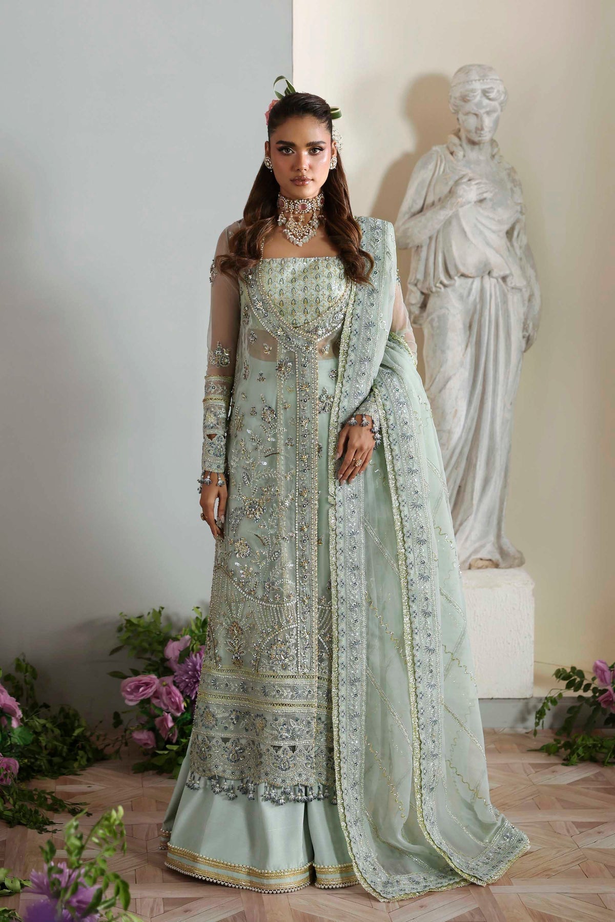 Model wearing Akbar Aslam Aetheria blouse & trousers with dupatta