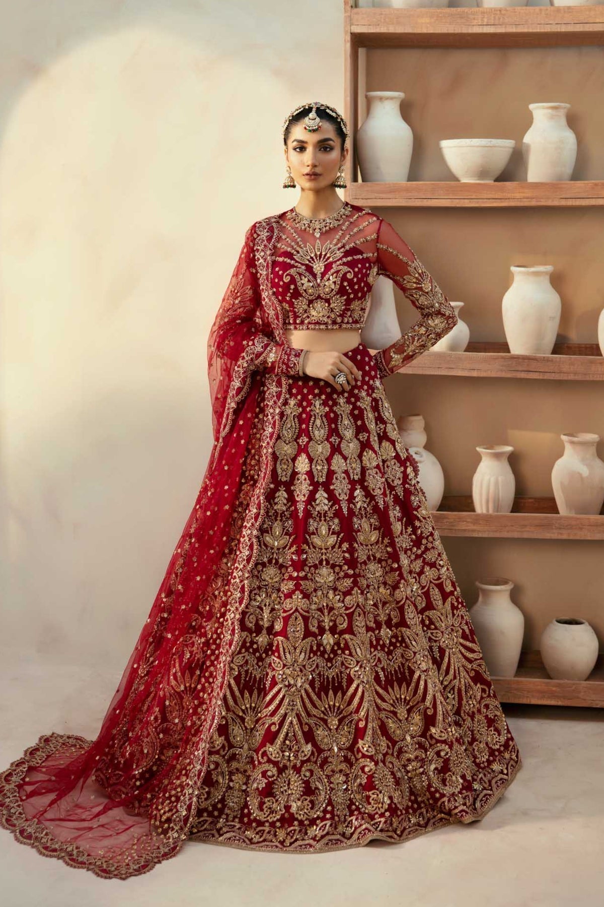 Model wearing Akbar Aslam Embyrlen maxi & lehenga