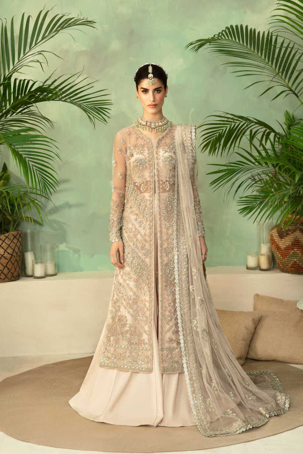 Model wearing Akbar Aslam Imperia shirt & trousers with dupatta