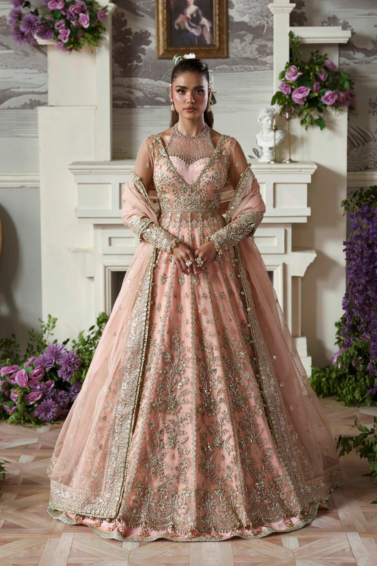 Model wearing Akbar Aslam Sanoura blouse & lehenga with dupatta