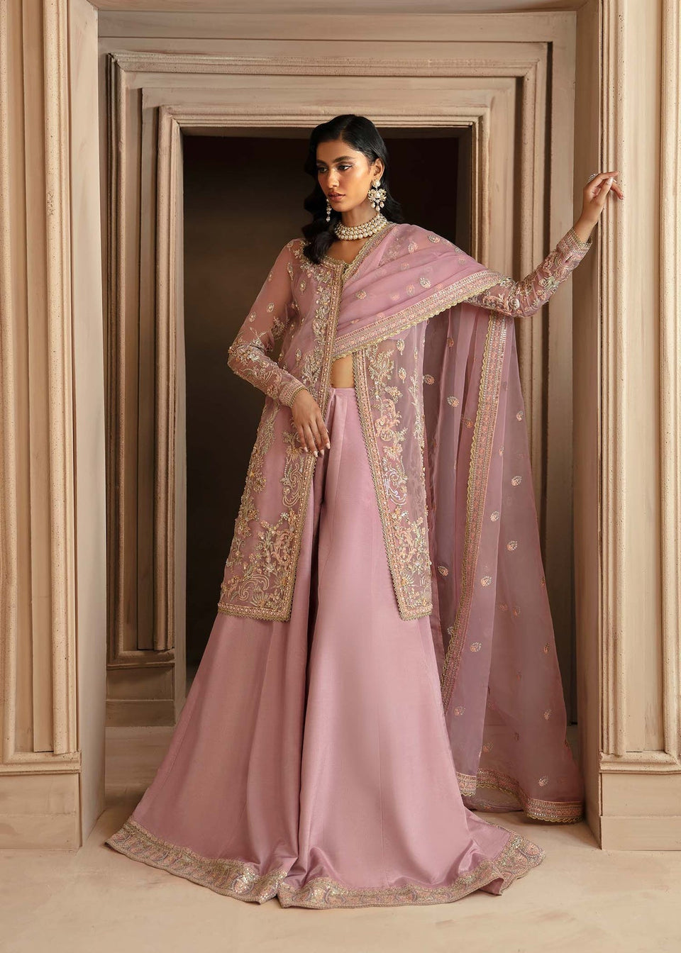 Model wearing Akbar Aslam Seraphine shirt & sharara with dupatta
