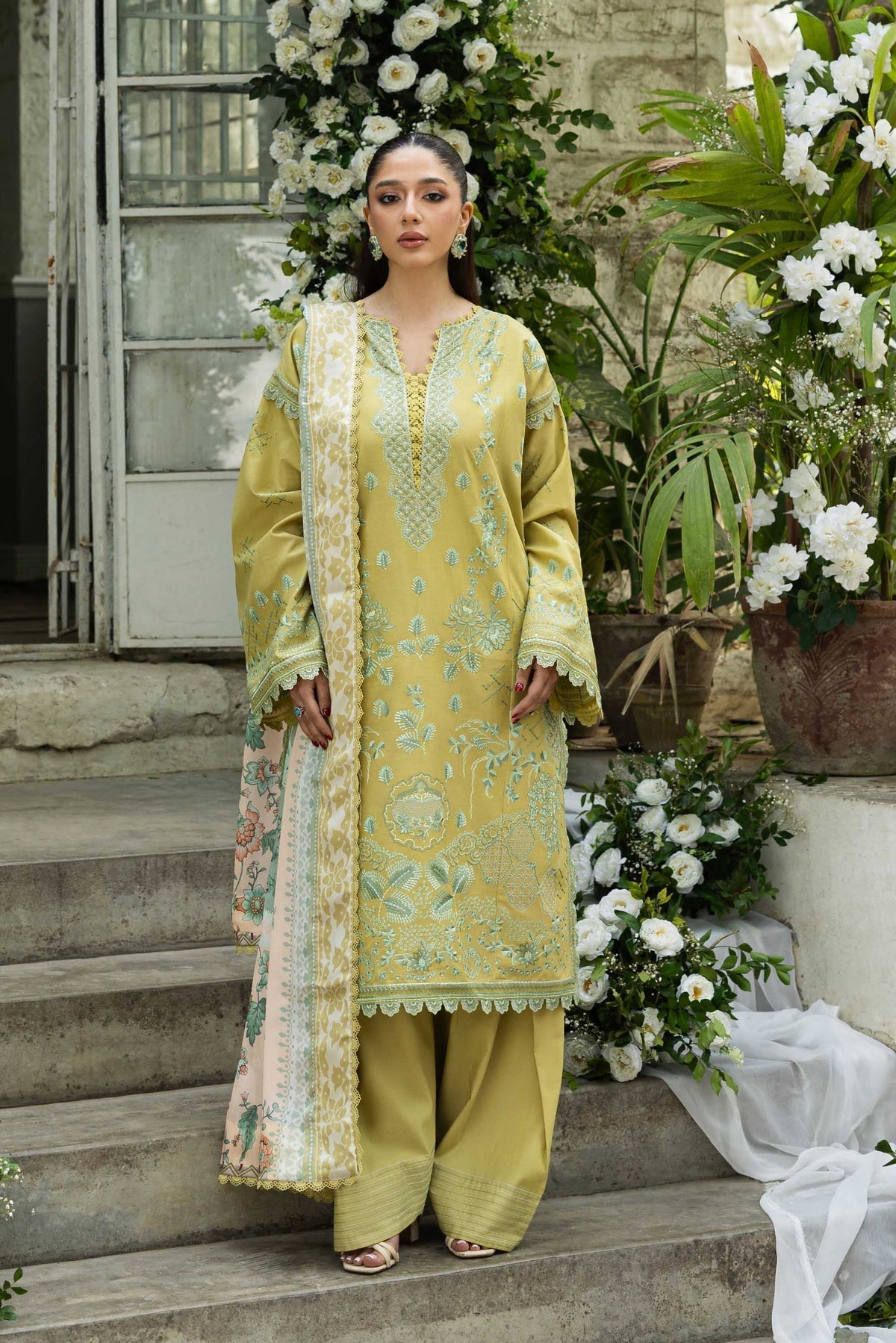 Model wearing Akbar Aslam Elysia shirt & trousers with dupatta