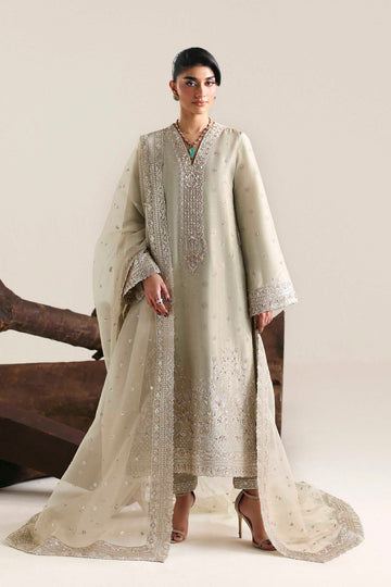 Model wearing Akbar Aslam Aurex shirt & trousers with dupatta