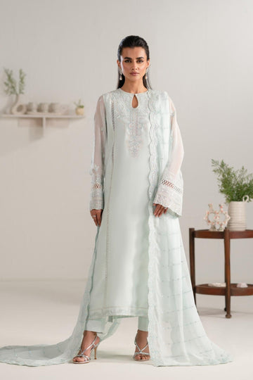 Model wearing Akbar Aslam Parizah long shirt & trousers