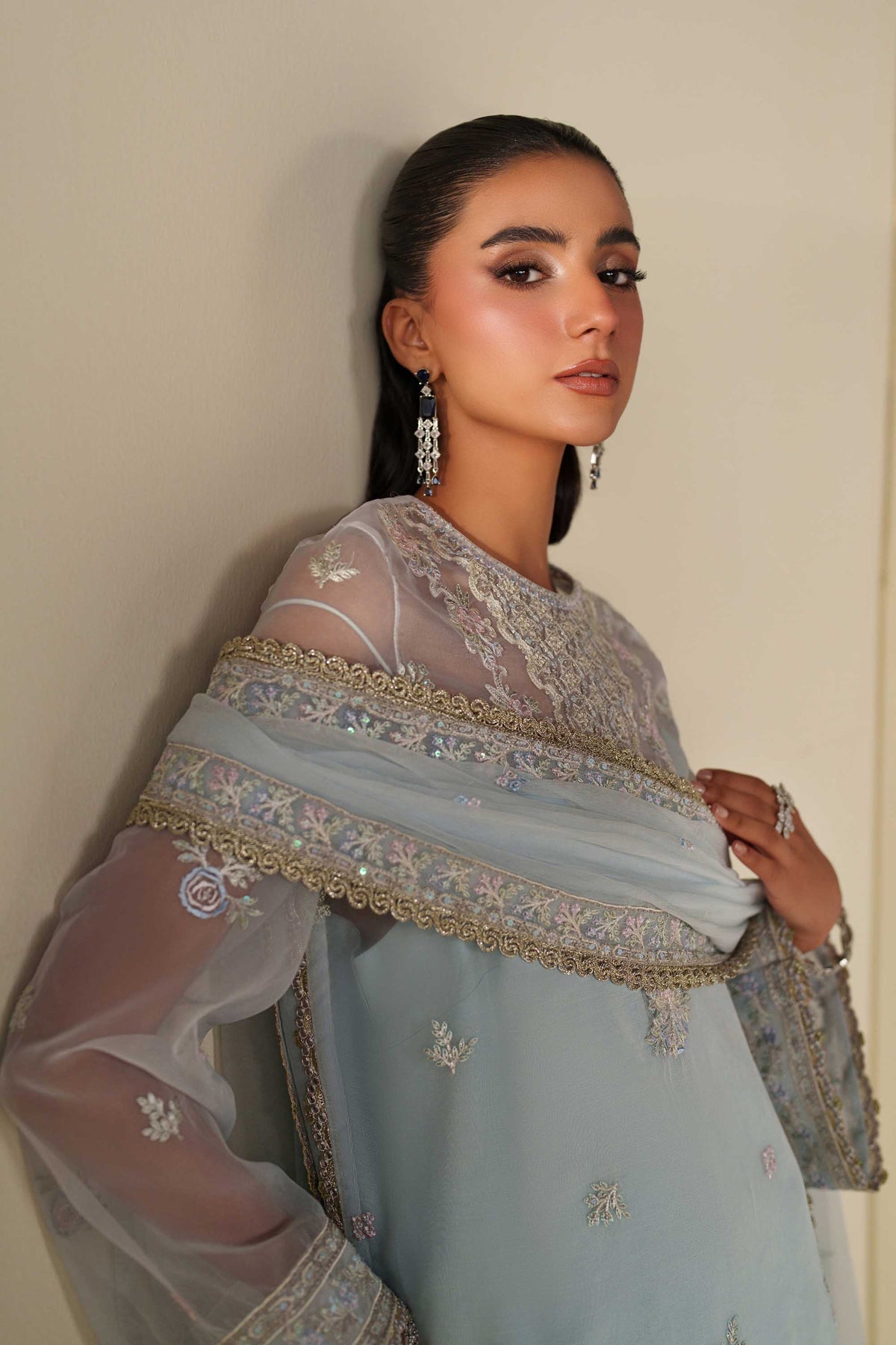 Akbar Aslam Poise back view