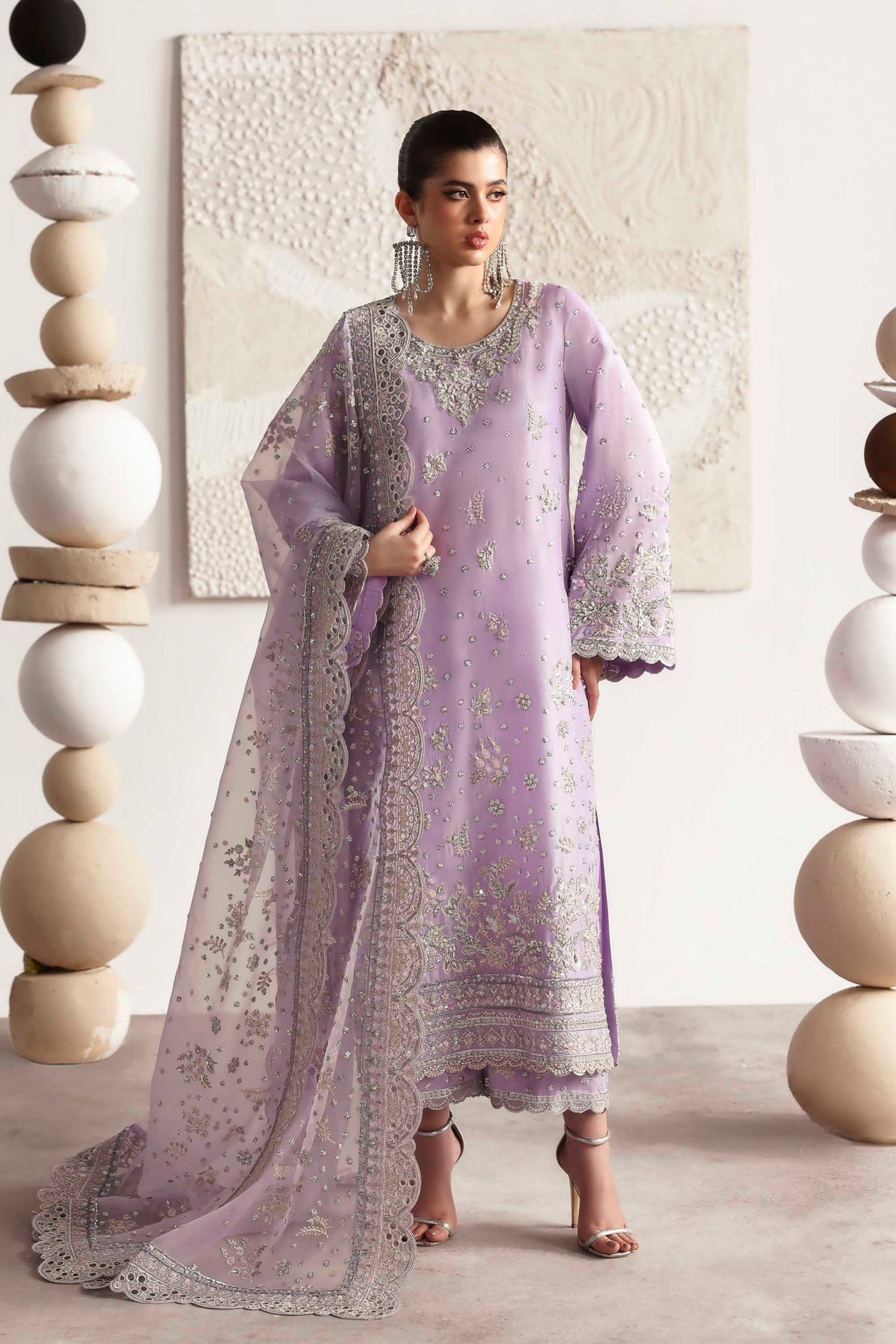 Model wearing Akbar Aslam Champagne champagne shirt & trousers with dupatta