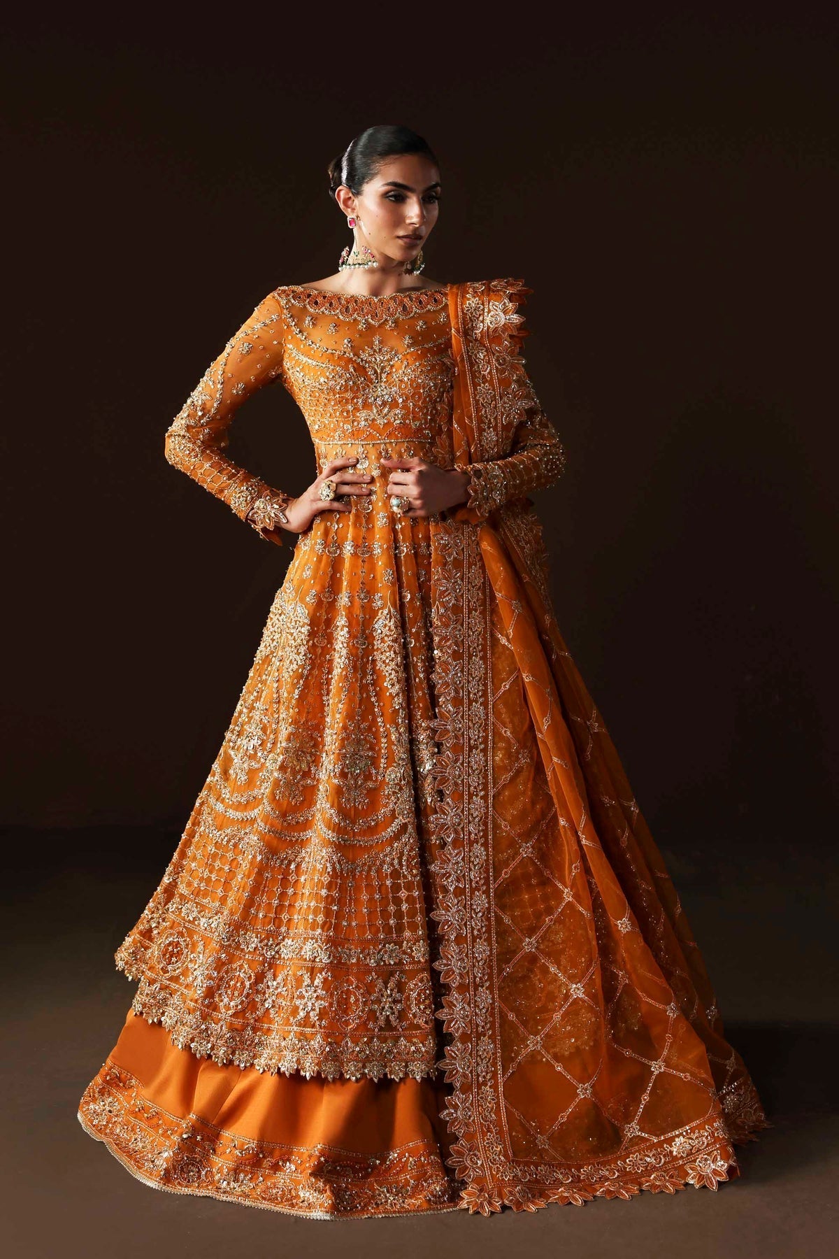 Model wearing Akbar Aslam Muselet blouse & lehenga with dupatta