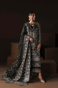Model wearing Akbar Aslam Noir saree with blouse