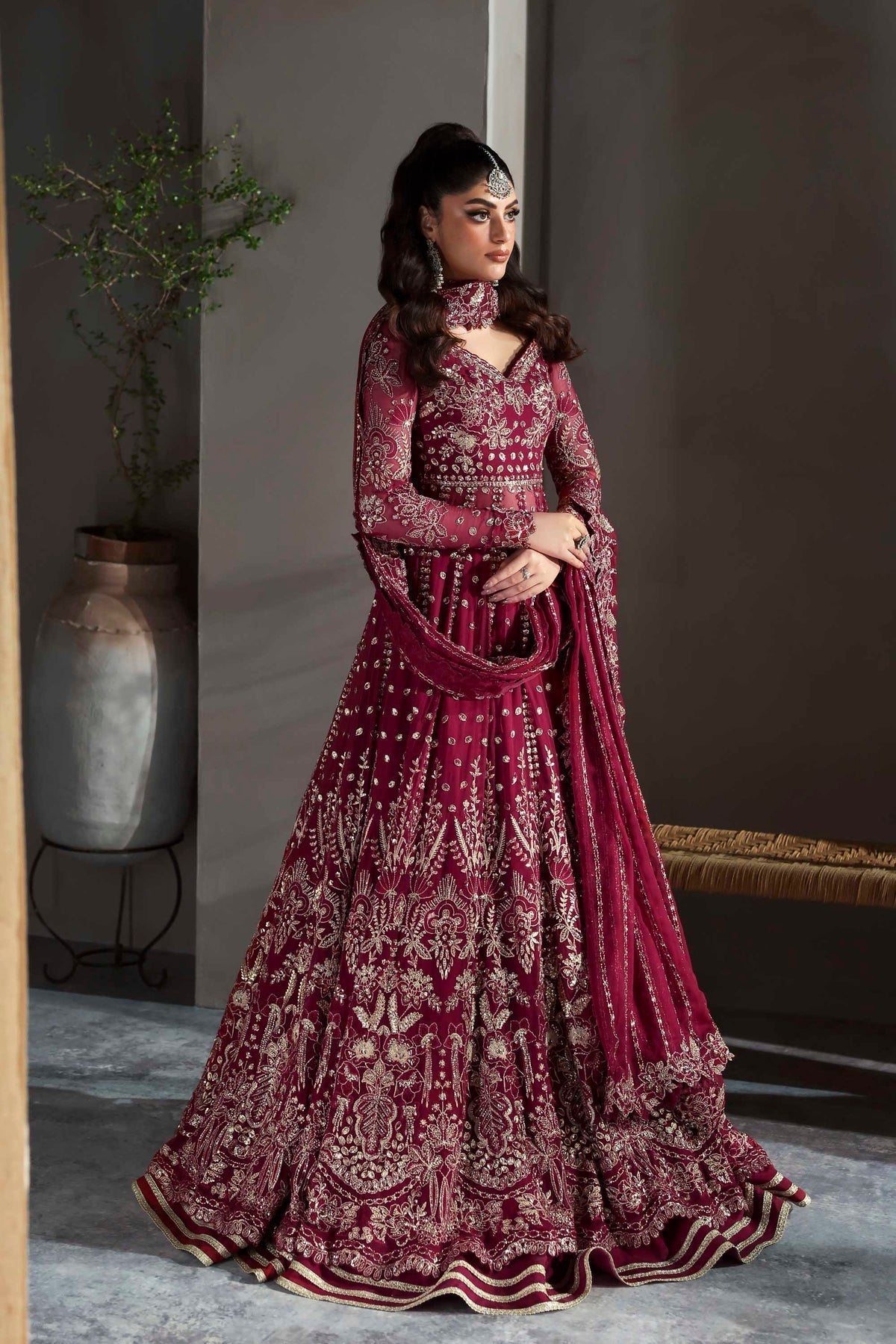 Model wearing Akbar Aslam Mahroze panelled maxi with dupatta